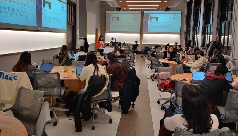 Participants working on laptops during a microbiome bioinformatics workshop